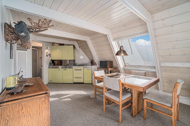 2047 W Martin Lake Rd, Gaylord, MI 49735 - dining room with vaulted ceiling with beams, wood walls, light carpet, and wooden ceiling