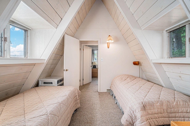 2047 W Martin Lake Rd, Gaylord, MI 49735 - bedroom with multiple windows, carpet, and lofted ceiling