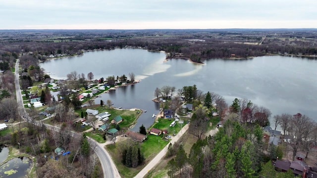 birds eye view of property featuring a water view and a residential view