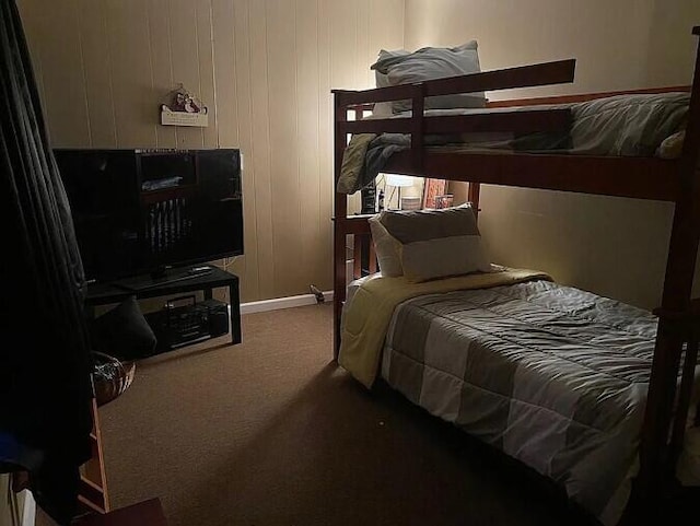 carpeted bedroom with baseboards