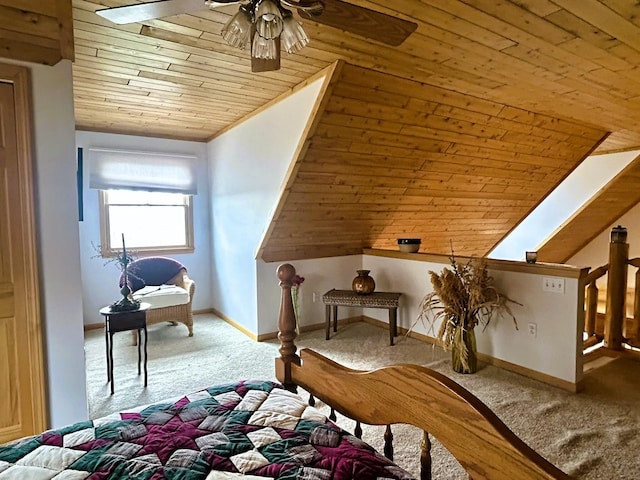 bedroom featuring carpet flooring, baseboards, vaulted ceiling, and wood ceiling