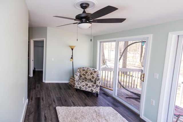 234 Pocahontas Ave, Roscommon, MI 48653 - sitting room featuring baseboards, a ceiling fan, and wood finished floors