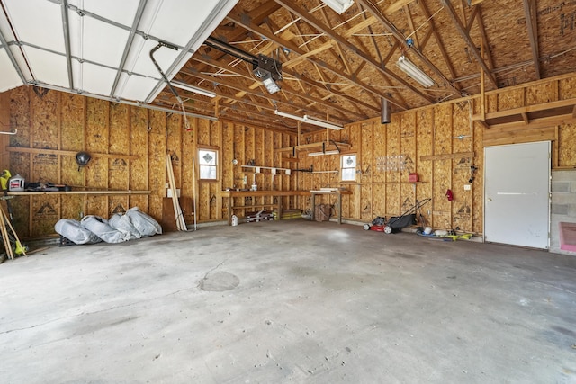 207 Cindy Ave, Roscommon, MI 48653 - garage with a workshop area