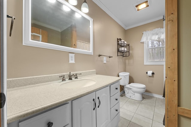 207 Cindy Ave, Roscommon, MI 48653 - full bathroom with ornamental molding, vanity, toilet, tile patterned flooring, and baseboards