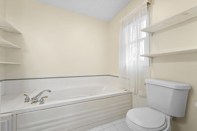 207 Cindy Ave, Roscommon, MI 48653 - full bath featuring toilet, a garden tub, and tile patterned floors