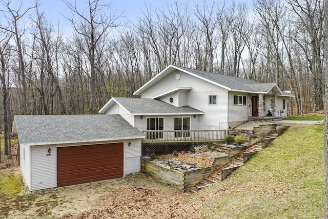 207 Cindy Ave, Roscommon, MI 48653 - view of home's exterior featuring a deck and roof with shingles