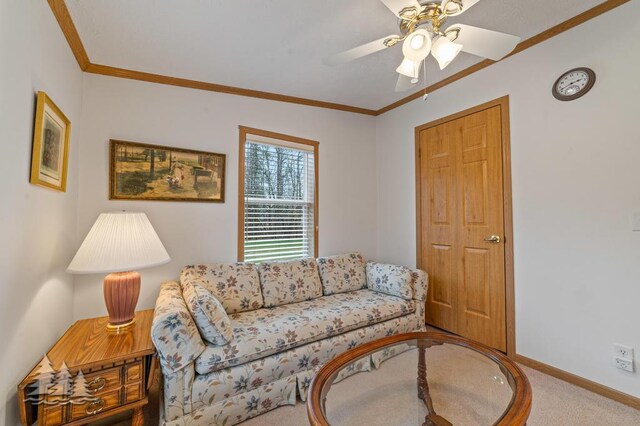 5335 Pinecrest Dr, Lewiston, MI 49756 - living area featuring crown molding, carpet flooring, baseboards, and a ceiling fan