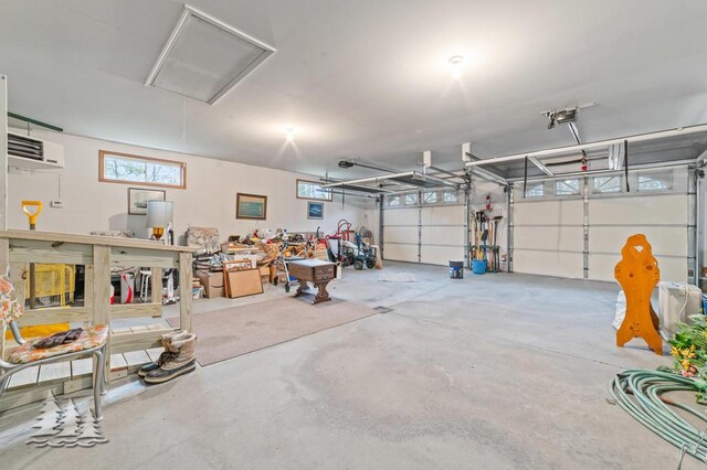 5335 Pinecrest Dr, Lewiston, MI 49756 - garage with a garage door opener