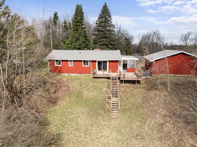 15757 Lakeway Dr, Wolverine, MI 49799 - view of front of property featuring a wooden deck and stairs