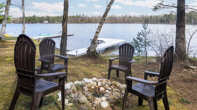 5012 Green Acre Dr, Frederic, MI 49733 - dock with a water view and a view of trees