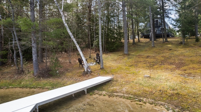 5012 Green Acre Dr, Frederic, MI 49733 - view of yard featuring a wooden deck