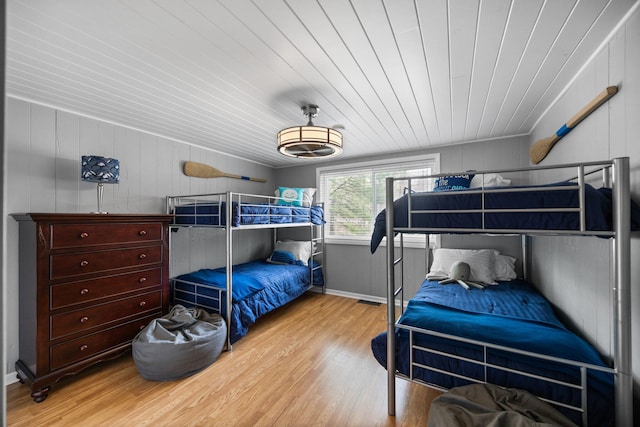 5012 Green Acre Dr, Frederic, MI 49733 - bedroom with wood finished floors and wood ceiling