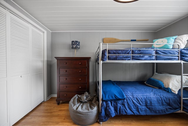 5012 Green Acre Dr, Frederic, MI 49733 - bedroom featuring wood finished floors