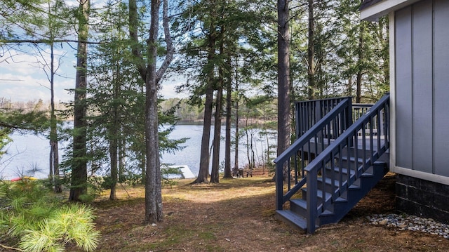 5012 Green Acre Dr, Frederic, MI 49733 - view of yard with a water view and stairs