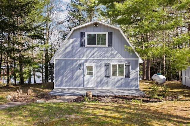 5012 Green Acre Dr, Frederic, MI 49733 - rear view of property with a gambrel roof