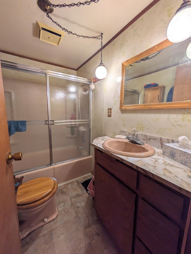 3617 Dill Dr, West Branch, MI 48661 - full bathroom featuring toilet, vanity, enclosed tub / shower combo, wallpapered walls, and crown molding