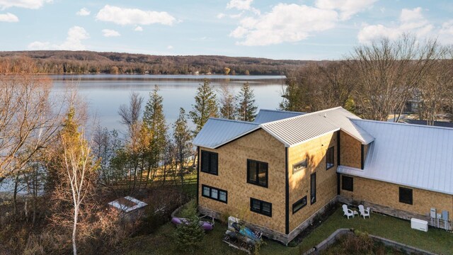 835 M-88, Bellaire, MI 49615 - view from above of property featuring a nearby body of water and a heavily wooded area