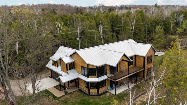 835 M-88, Bellaire, MI 49615 - view of subject property featuring a heavily wooded area