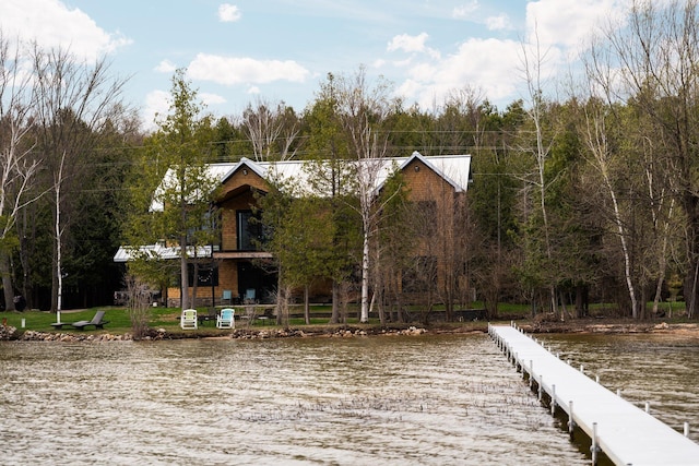 835 M-88, Bellaire, MI 49615 - exterior space featuring a water view, a wooded view, and metal roof