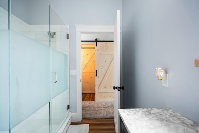 835 M-88, Bellaire, MI 49615 - bathroom with wood finished floors and a stall shower
