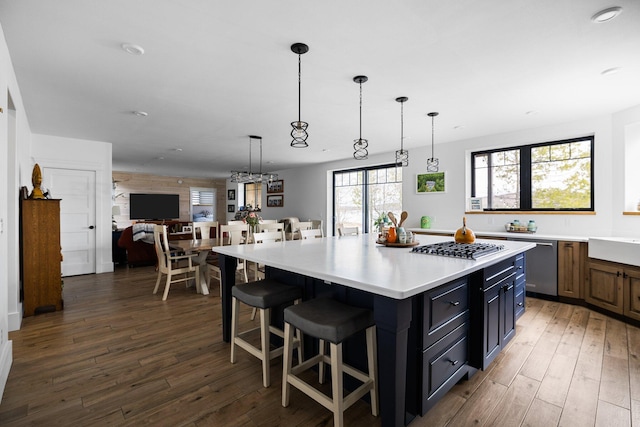 835 M-88, Bellaire, MI 49615 - kitchen with light countertops, wood-type flooring, a sink, appliances with stainless steel finishes, and recessed lighting