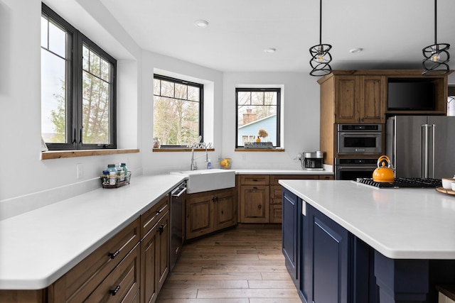 835 M-88, Bellaire, MI 49615 - kitchen with a sink, stainless steel appliances, healthy amount of natural light, light wood finished floors, and recessed lighting