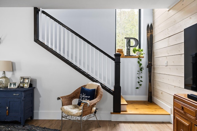 835 M-88, Bellaire, MI 49615 - stairway with baseboards and wood finished floors