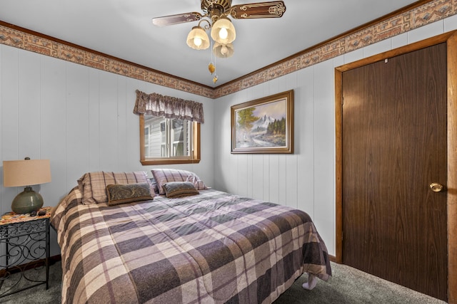 120 Beechwood Ave, Houghton Lake, MI 48629 - bedroom with carpet flooring, ceiling fan, and ornamental molding