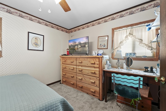bedroom featuring a ceiling fan and carpet