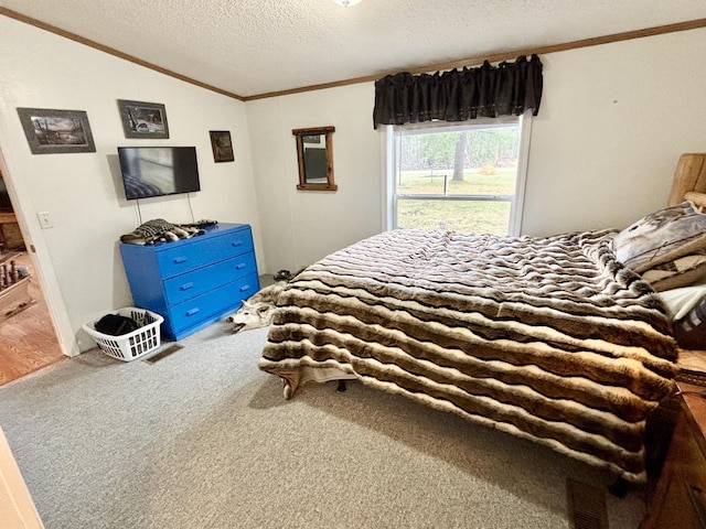3313 Pleasant View Dr, Lewiston, MI 49756 - bedroom featuring crown molding, a textured ceiling, lofted ceiling, and carpet floors