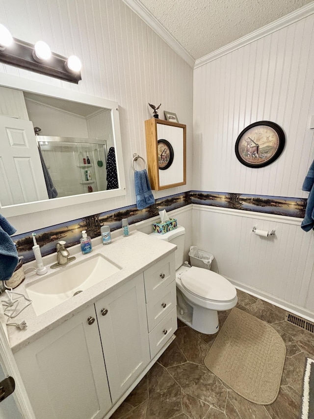 3313 Pleasant View Dr, Lewiston, MI 49756 - bathroom featuring ornamental molding, a stall shower, vanity, a textured ceiling, and wooden walls