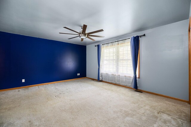 1350 Pine Point Dr, Lewiston, MI 49756 - unfurnished room featuring ceiling fan, carpet, and baseboards