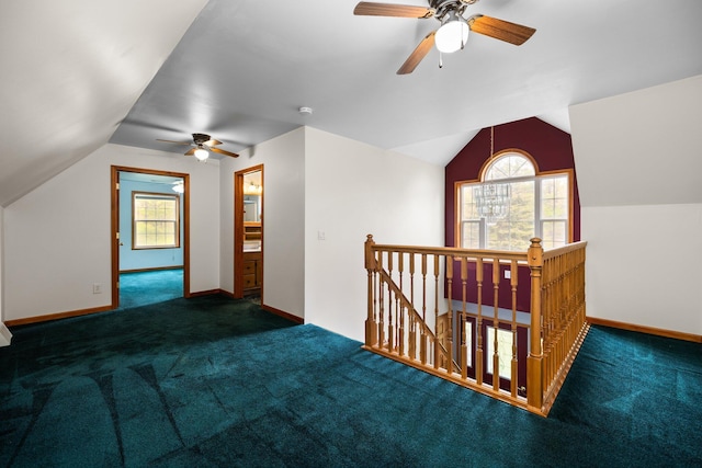 1350 Pine Point Dr, Lewiston, MI 49756 - additional living space featuring ceiling fan, vaulted ceiling, carpet floors, healthy amount of natural light, and baseboards