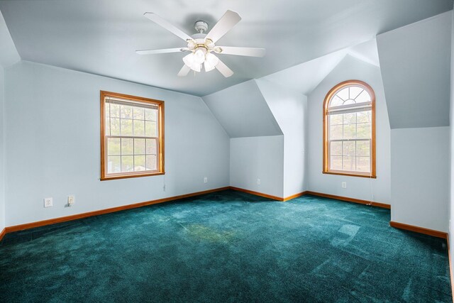 1350 Pine Point Dr, Lewiston, MI 49756 - additional living space featuring vaulted ceiling, carpet, baseboards, and a ceiling fan