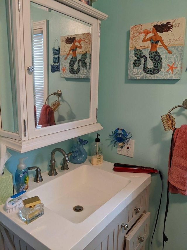 11052 W Higgins Lake Dr, Roscommon, MI 48653 - bathroom featuring vanity