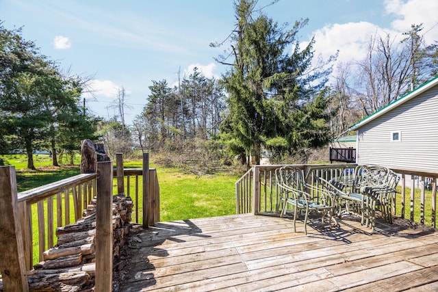 4441 Judy Ave, Lewiston, MI 49756 - wooden terrace featuring a yard