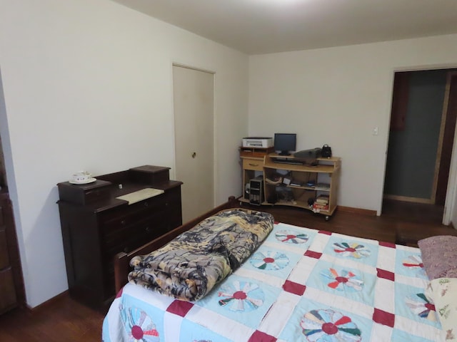 bedroom with wood finished floors