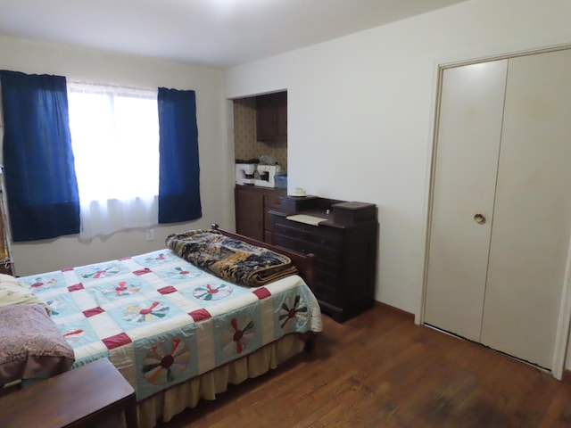 bedroom with wood finished floors