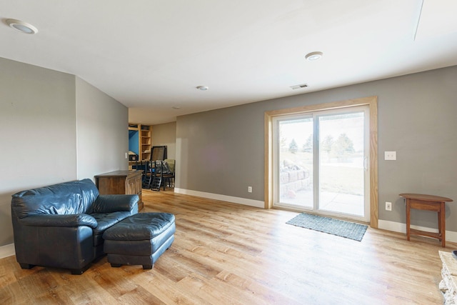 2211 N Kerby Rd, Owosso, MI 48867 - sitting room featuring wood finished floors and baseboards