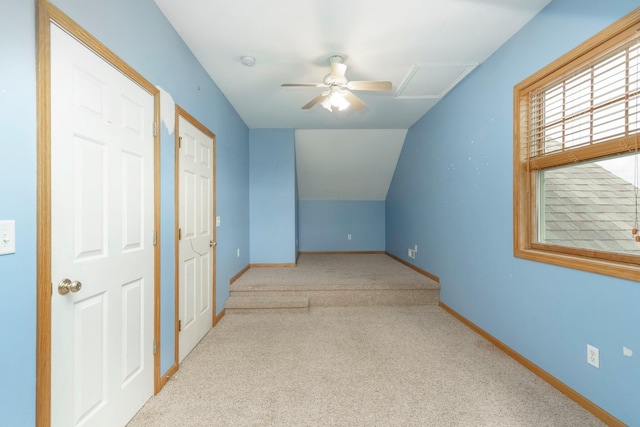 2211 N Kerby Rd, Owosso, MI 48867 - additional living space featuring carpet floors, a ceiling fan, baseboards, and lofted ceiling