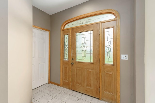 2211 N Kerby Rd, Owosso, MI 48867 - entryway with light tile patterned floors and baseboards