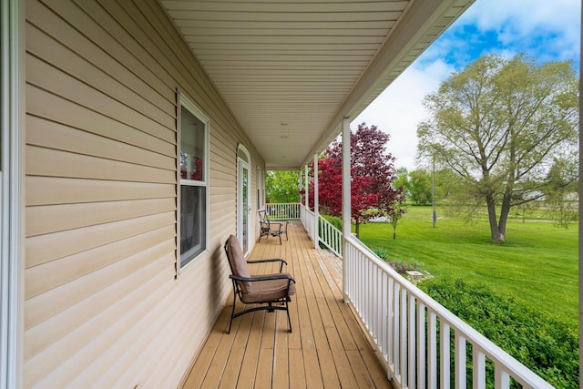 2211 N Kerby Rd, Owosso, MI 48867 - deck with a porch and a lawn