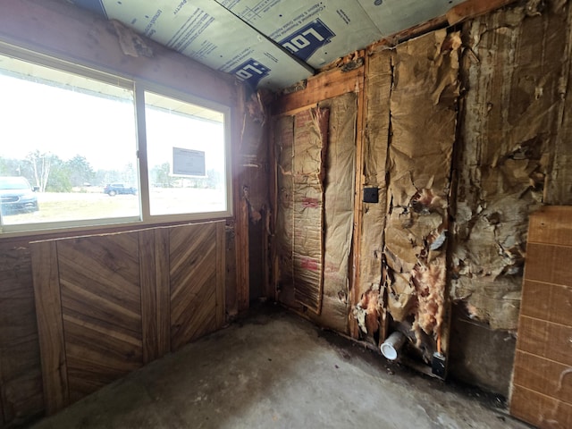 misc room with concrete flooring