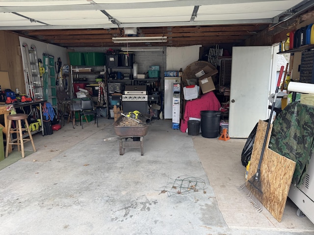 garage with a workshop area