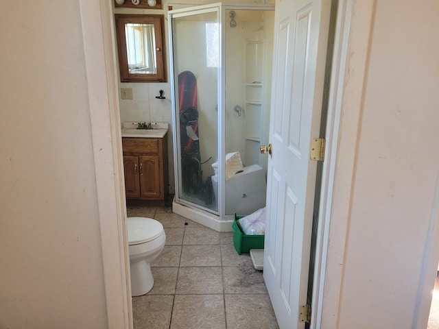 20635 Fardon St, Onaway, MI 49765 - full bathroom with a stall shower, vanity, and toilet