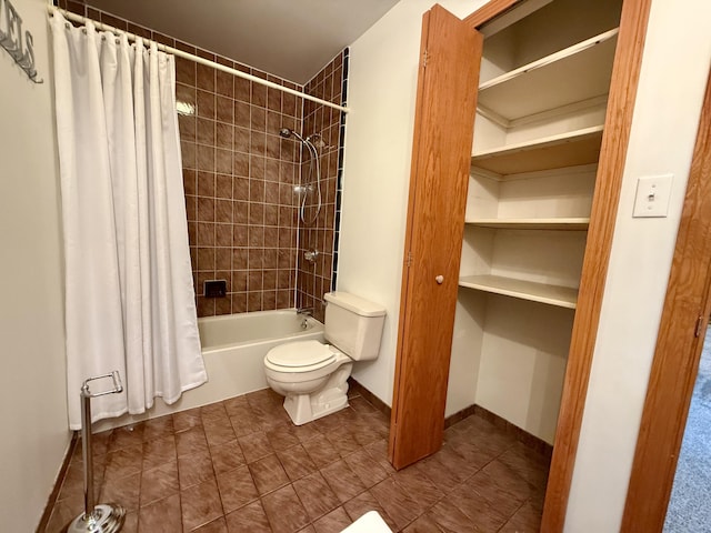 bathroom with shower / tub combo with curtain, tile patterned flooring, toilet, and baseboards