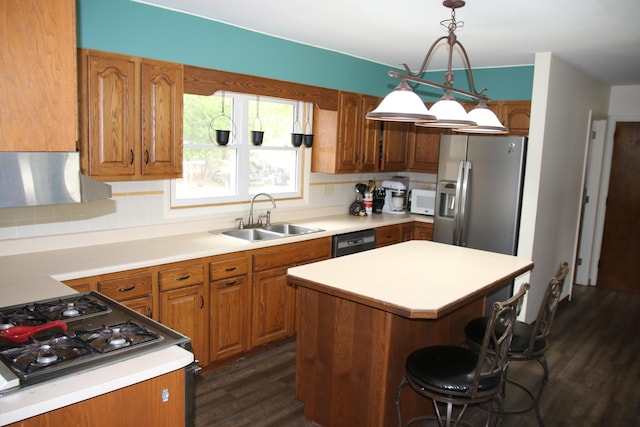 567 Long Rapids Rd, Alpena, MI 49707 - kitchen featuring stainless steel fridge with ice dispenser, dark wood-type flooring, gas range, exhaust hood, and brown cabinets