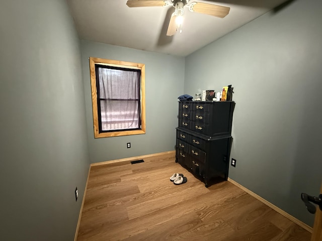 3140 Kitchen Rd, Cheboygan, MI 49721 - bedroom featuring light wood-style floors, visible vents, baseboards, and ceiling fan
