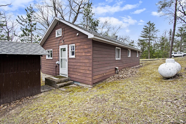 exterior space with an outbuilding