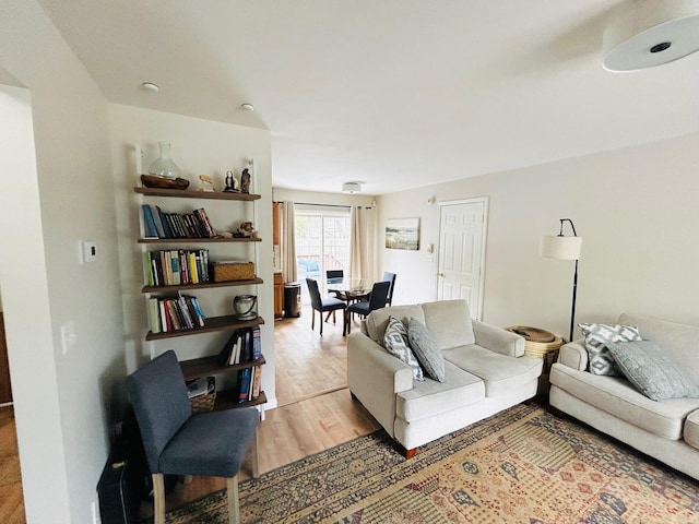 living room with wood finished floors